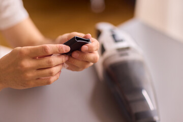 Unboxing a brand new handheld vacuum cleaner attachment, perfect for efficient cleaning tasks