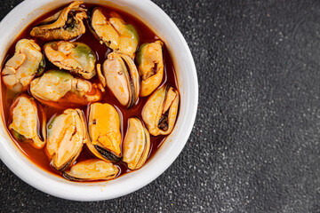 Mussels canned seafood appetizer dish organic product fresh tasty gourmet food background on the table rustic food top view copy space keto paleo pescetarian diet vegetarian food
