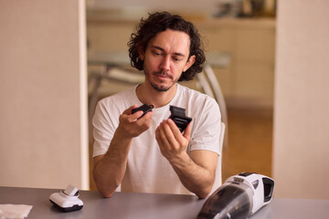 Unboxing a brand new handheld vacuum cleaner attachment, perfect for efficient cleaning tasks