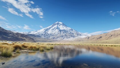 A breathtaking view of a snow-capped mountain peak with clear blue skies reflecting the winter chill.