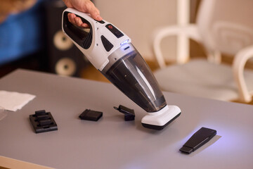 Unboxing a brand new handheld vacuum cleaner attachment, perfect for efficient cleaning tasks