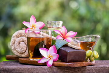 Neem extract is used to make soap, tea, mouthwash and is an ingredient in toothpaste on natural background.