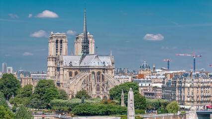 Paris with Cite Island and Cathedral Notre Dame de Paris timelapse from the Arab World Institute...