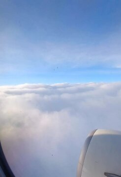 Clouds view from the airplane window,, traveling bt the plane and flying