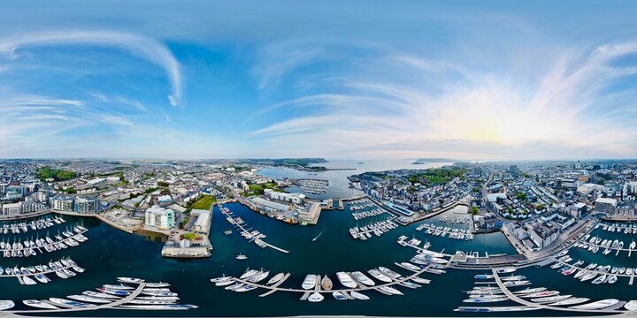 Panoramic aerial view of Plymouth marina at sunset.