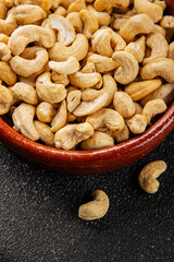 Cashew nuts natural superfood natural food vegetables dish organic product fresh tasty gourmet food background on the table rustic food top view copy space keto paleo diet vegetarian vegan food