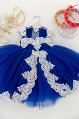 Blue Baby Dress On White Background With Decorations