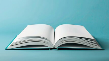 Obraz premium Page blanche d'un livre ouvert. ArriÃ¨re-plan turquoise visible sur le magazine ou la brochure