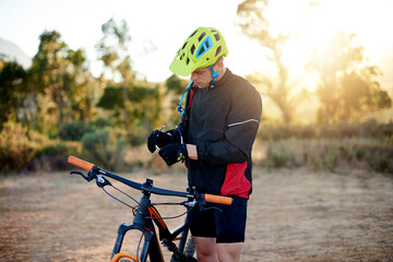 Cyclist, healthy and man with bicycle, travel and athlete with fitness for journey, trail and...