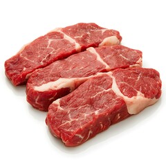 Three raw beef steaks lie neatly arranged on a bright white background ready for grilling or cooking.