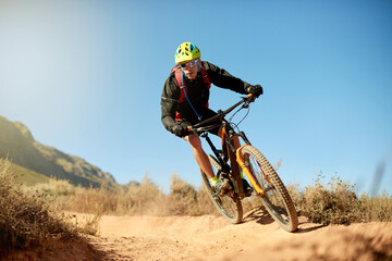 Man, mountain bike and path in nature for fitness, exercise and training for competition. Male...