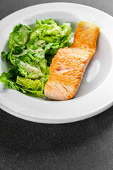 Salmon fried fish seafood dish fresh delicious gourmet food background on the table rustic food top view copy space keto paleo diet vegetarian food pescetarian diet