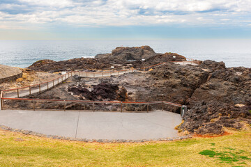 Kiama blowhole outside the town of Kiama, NSW. Australia. Popular blowhole capable of spraying...