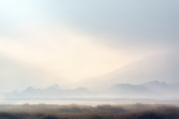 Fototapeta premium minimalistic landscape shrouded in mist and smoke creating serene atmosphere perfect for tranquil themes