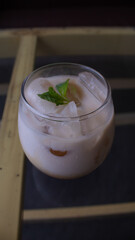 Iced Milk Coffee in a Clear Glass – Refreshing Café Beverage