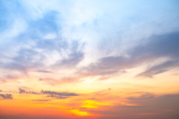 Fototapeta premium Beautiful , luxury soft gradient orange gold clouds and sunlight on the blue sky perfect for the background, take in evening,Twilight, Large size, high definition landscape photo