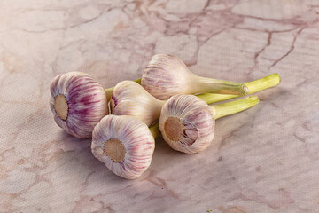 Raw young garlic bulb heap
