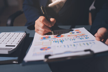 Expert woman asian female people review data number costing managerial account prepare monthly...