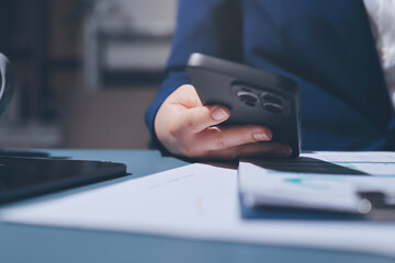 Expert woman asian female people review data number costing managerial account prepare monthly actual cost variance report at tax audit office. ESG sheet budget control ERP process service project.