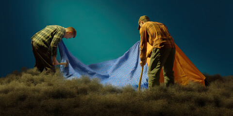Two Men Assembling a Tarp and Tent