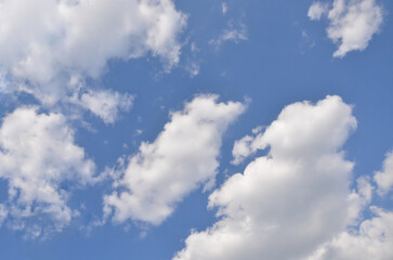 Horisontal blue sky with white fluffy clouds background. Nature sky landscape  in sunny day. 