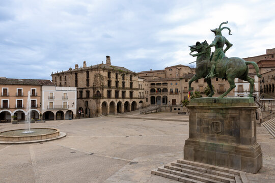 Statue of el cid campeador dominating plaza mayor in olite, spain