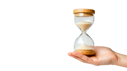 Human hand gently holding sand hourglass timer device. cut out transparent