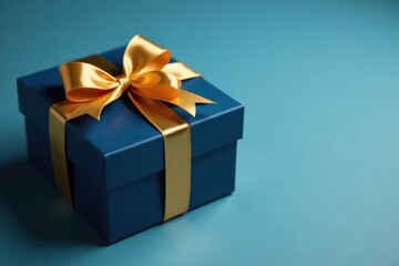 Fototapeta premium Dark blue gift box with luxurious gold ribbon Perfect Christmas or birthday gift , bow, blue