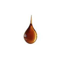Single Drop of Amber Liquid, Isolated on Black Background