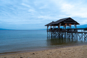 Wooden pier on the beach of Lake Poso, Tentena, Sulawesi
