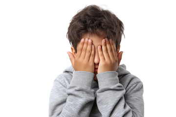 Fototapeta premium Young boy covering eyes with hands isolated on white transparent background