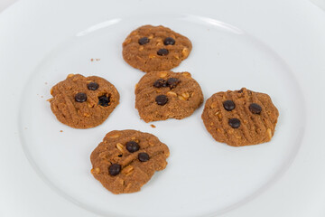 Plate of Homemade Chocolate Chip and Peanut Cookies for a Sweet Dessert