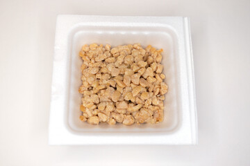 Crushed natto (fermented soybeans) in a pack