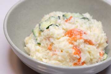 Close-up of Japanese potato salad with cucumber and carrot