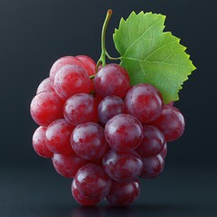 Fototapeta premium red grape with smooth glossy surface, leaf attached, clean white