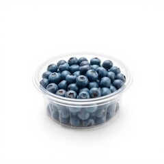 Fresh blueberries in clear container. Heap of ripe, blue berries isolated on white background.