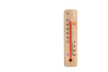 Wooden celsius scale thermometer isolated on white background. Ambient temperature plus 50 degrees...