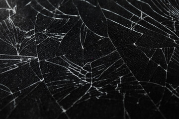 The pattern on the glass is cracked. damage to the glass.  cracked texture