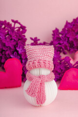 Cute greeting card for Valentine's or Mothers Day. Snowman with handmade hearts and lilac flowers