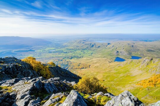 Breathtaking panoramic view of rolling hills and valleys under a clear blue sky