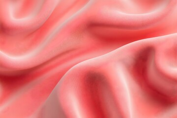 Obraz premium Soft, coral-colored fabric with gentle, flowing drapes and subtle highlights