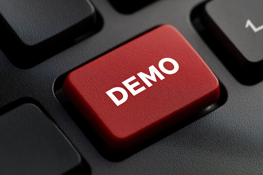 Red "DEMO" key on a black computer keyboard. Symbolizes access to test software or features. Easy usability to try the software.