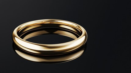 Simple gold wedding band on black reflective surface.