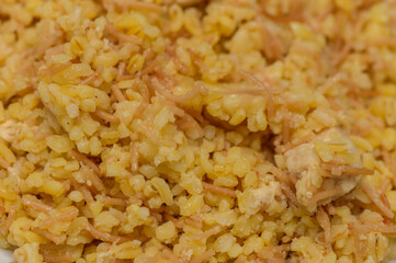 Traditional Cypriot Bulgur Wheat with Pasta and Chicken Dish