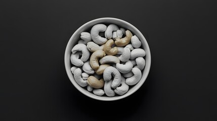 Bowl of mixed cashews on a clean, minimal background