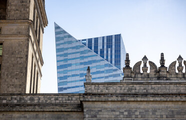 Modern glass architecture and window reflections in Warsaw