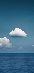 Naklejka premium Tranquil Seascape with a Solitary Cloud