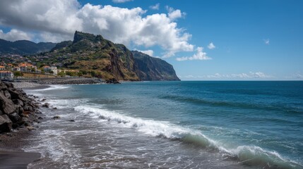 Obraz premium Scenic coastal landscape with rocky cliffs and clear blue ocean under a vibrant sky.