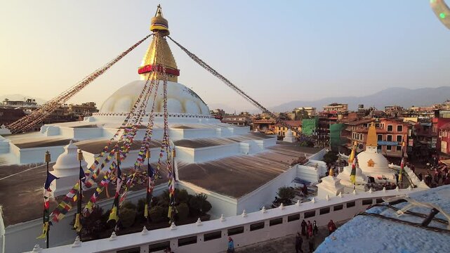 Kathmandu, Nepal - 15th november, 2023: time lapse of Bouddha or Boudhanath on sunset and visitors sightseeing city. Khasti Chaitya and Khāsa Chaitya stupa in Kathmandu, Nepa