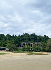 abandoned hotel after tsunami on the beach in Thailand, Phuket. Dangerous development in the tropics, deserted beach